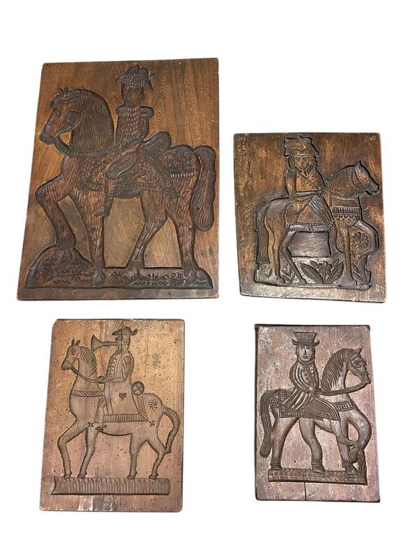 Assorted antique wooden speculaas molds around 1840