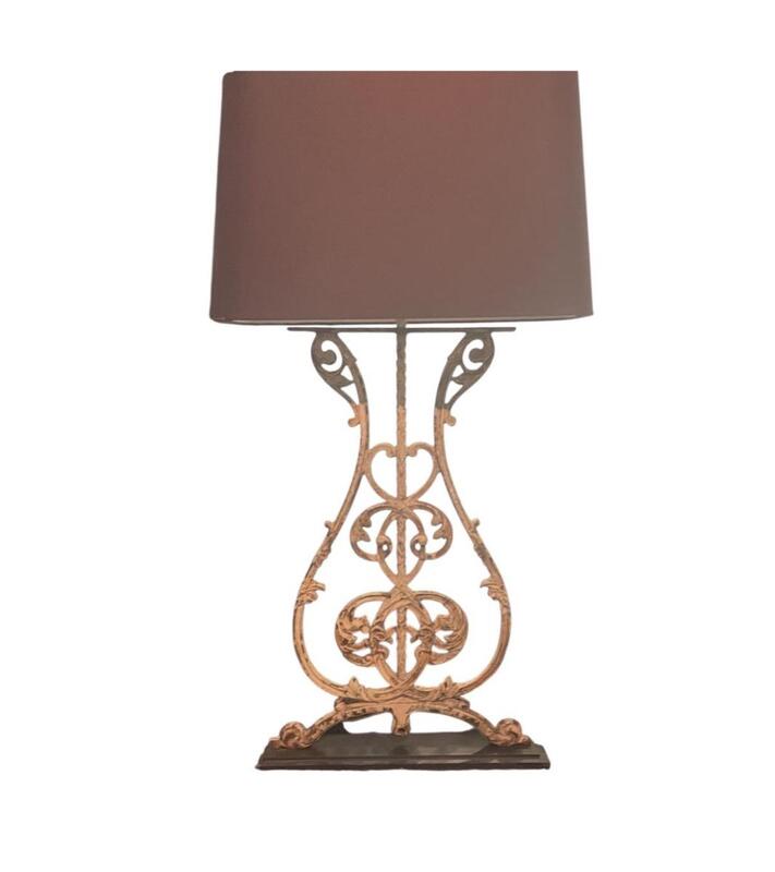 Lamp made with an iron base in patinated beige.  Also available in black.